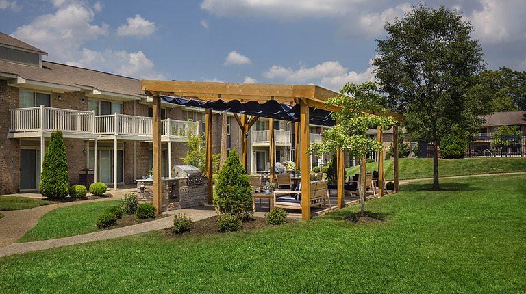 Lush Greenspace with Outdoor Dining Spaces